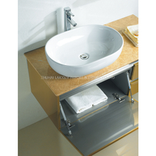 Baño del hotel 304 Gabinete de baño dorado de acero inoxidable con espejo redondo